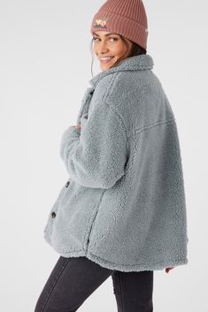 The perfect anytime jacket, ready to wear on cool seaside mornings or late nights out. It's made with a cozy sherpa material, has a front button closure and relaxed oversized fit. O'Neill Women's woven jacket 30" In length Super soft sherpa feel Front patch pockets Button closure and cuffs On seam side pockets 100% Polyester hi-pile fleece | O'Neill Women's Heath High Pile Oversized Fleece Jacket in Silver Blue, Size Large, Polyester/Sherpa Oversized Cozy Fleece Jacket For Loungewear, Cozy Fleece Jacket With Button Closure, Blue Fleece-lined Outerwear For Loungewear, Blue Oversized Fleece Outerwear, Suits Series, Loungewear Outfits, Spring Suit, Girl Beanie, Womens Wetsuit