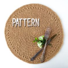 a place mat with the word pattern written on it and two forks resting on top