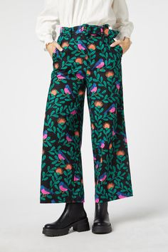 Belted loose straight leg pant - This vibrant hand painted print showcases little Pink Robins surrounded by beautiful pincushion protea blooms- high waisted rise- style with the matching fabric belt- wide full length leg- side pockets- made of a smooth linen, cotton blend- available in black Product Code: PGFV406 Funky Trousers Outfit, Pink Pants Teacher Outfit, Sensory Friendly Outfits Adults, Jess Outfits, Play Closet, Teaching Fits, Artist Vibes, Teacher Outfit Ideas, Aesthetic Pants