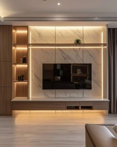 modern living room with marble wall and built - in entertainment center, tv unit and sofa