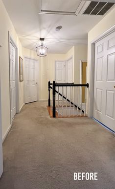 an empty hallway with white doors and black railing on the second floor, before and after remodeling