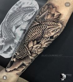 a man's arm with a black and white koi fish tattoo on it