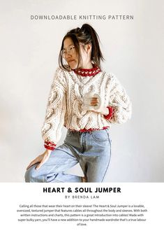 a woman is wearing a sweater and jeans