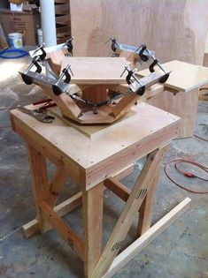 two wooden tables with tools on top of them