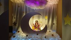 an image of a nativity scene with stars and clouds