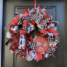 Merry Christmas Buffalo Check Deco Mesh Wreath Greet guests with this cheerful buffalo plaid deco mesh wreath. The wreath is filled with fabric deco mesh and then accented with plaid, stripe and polka dot ribbons. We finish it off with a large bow and wooden Merry Christmas Sign. We use quality materials and secure all items so that your wreath will last for years to come. Take the stress out of decorating by displaying it on your front door or inside over a fireplace or mirror. Extend the life Buffalo Plaid Deco Mesh Wreath, Plaid Deco Mesh Wreath, Door Wreaths Burlap, Patriotic Door Hanger, Bunny Door Hanger, Burlap Christmas Wreath, Christmas Mesh Wreaths, Christmas Door Wreaths, Wreath Home Decor