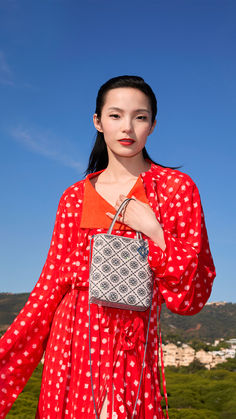 Celebrate Lunar New Year with our limited-edition collection.

Xiao Wen Ju wearing Tory Burch Spring/Summer 2025 and the T Monogram Night Owl Tote