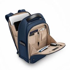 Perfect for your daily commute (and beyond), this pack has your back with its slim-yet-spacious design. Pack your business essentials, keep them organized, and easily grab them on the go. Fits up to 14" laptops. SKU: KK520-4 14" Laptop Compartment Slip-Through Back Panel Internal & External Pockets INTERIOR FEATURES The SpeedThru™ pocket makes finding all your important items effortless. Keep tabs on your bag with a pocket designed to conceal a digital tracker in the SpeedThru™ pocket. Tech compartment includes an integrated padded laptop sleeve protects most 14" computers and slip pocket for a tablet. Front pocket equipped with organization and a RFID shielding to secure your personal data. A convenient key fob found in the organizer section guarantees your keys always have a home. Keep y Briggs And Riley Backpack, Slim Backpack, Kids Umbrellas, Tech Bag, Large Luggage, Briefcase Women, Work Backpack, Leather Laptop Backpack, Hardside Luggage