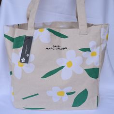 Marc Jacobs Daisy Tote With Cosmetic Pouch In Cream Flowery Pattern Brand New Smoke Free/Pet Free Home Spring Floral Print Everyday Bags, Spring Everyday Floral Print Bags, Spring Floral Print Cream Bags, Cream Rectangular Bag With Floral Print, Rectangular Cream Bag With Floral Print, Everyday White Shoulder Bag With Floral Print, Cream Floral Print Rectangular Bag, Everyday White Floral Print Shoulder Bag, Painted Canvas Bags