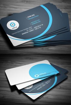 two business cards with blue circles on the front and back, one is black and white