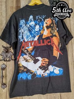 ABOUT THIS METALLICA T SHIRT... This iconic super soft vintage style t shirt is screen printed by hand. Printed on perfect super high quality 100% cotton crew neck tees. Please note: the shirt shown in these pictures is the exact shirt you will receive. This t shirt is thick and sturdy but still comfortable and super soft. Inspired by retro styles of the past, these t shirts bring all that goodness back, but on an incredible new yet old school t shirt. Extremely hard to get a hold of, and even h Acid Wash Band Merch T-shirt With Graphic Print, Retro Festival T-shirt With Screen Print, Festival Graphic Print Crew Neck T-shirt, Festival Crew Neck T-shirt With Graphic Print, Vintage Festival T-shirt With Crew Neck, Vintage Short Sleeve T-shirt For Music Festivals, Festival Graphic Tee With Sublimation Print, Band Merch T-shirt For Festival, Acid Wash T-shirt With Graphic Band Merch Design