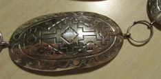 "Sterling silver link concho belt. Each link is 3 3/4\" long x 1 1/2\" wide. The rings and the loops to hold them on measure 1\" between each concho. Stamped WS. Sterling. 44 1/2 total length. Pretty stamp work has been done on each concho. Good condition and polished to a like new shine. Shipped by Insured US priority mail. SCB-1" Adjustable Silver Southwestern Belt Buckles, Artisan Silver Adjustable Belt Buckles, Artisan Adjustable Silver Belt Buckles, Southwestern Silver Belt Buckle With Antique Detail, Concho Belt, Tucson Az, The Rings, Tucson, Priority Mail