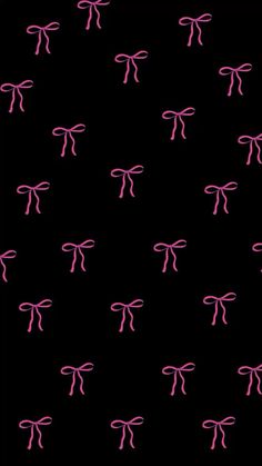 an image of pink bows on black background for wallpaper or wrapping paper, this pattern is very pretty