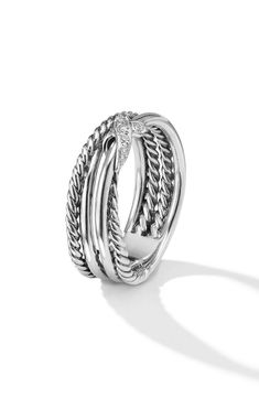 a white gold ring with twisted rope design on the front and center, set in 18k white gold