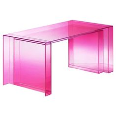 a pink glass desk sitting on top of a white floor