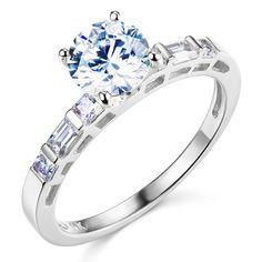 a white gold engagement ring with baguettes and side stones