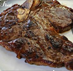 two pieces of steak on a plate with the caption that says, what is it?