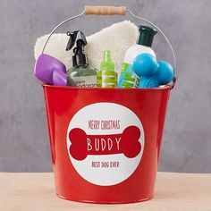 a red bucket filled with personal care items