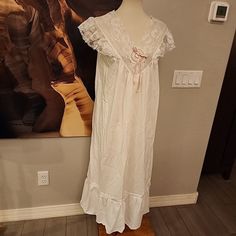 This Vintage Edwardian Nightgown By Lily Of France Is A Stunning Piece Of Cotton Material That Will Make You Feel Like A Queen. The White Color And Intricate Lace Detailing Add A Touch Of Elegance To This Full Nightgown, Which Is Perfect For A Comfortable Night's Sleep. The Dress Is From The 1960s And Is An Original Piece, Making It A Rare Find For Any Vintage Clothing Enthusiast. The Nightgown Is Available In Size M And Is Perfect For Regular Size Types. The Dress Is Made In The United States And Is An Excellent Addition To Any Vintage Clothing Collection. The Cottagecore Look Of The Dress Is Sure To Make You Feel Cozy And At Home. Get Ready To Relax In Style With This Beautiful Vintage Edwardian Nightgown, Random Character, Vintage Nightgown, Fantasy Fashion, Relaxed Style, Vintage Clothing, Lace Detail, Night Gown, Cotton Material