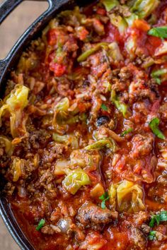 a large pot filled with meat and vegetables