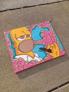 a simpsons painting on the side of a building