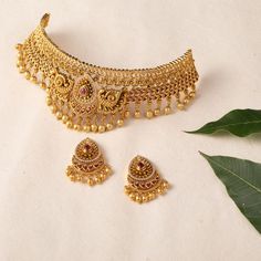 Shop Now: Tarinika's Temple Classic Antique Choker Set Gold Jewelry Traditional, Vintage Gold Necklace Indian, Choker Necklace Indian Antiques, 5 Tola Gold Necklace Set Design, Indian Jewellery Design Traditional, Indian Jewelry Sets Bridal, Gold Set For Bride, Gold Jewellery Set Design Unique, Festive Temple Necklace With Intricate Design Choker