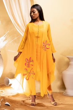 Mango yellow cotton silk chanderi applique overlay with floral motifs. Comes with a kurta, leggings pant and a separate inner slip.` - Aza Fashions Yellow Chanderi Kurta With Sheer Dupatta, Designer Yellow Mulmul Kurta, Yellow Mulmul Palazzo Set With Dabka Work, Yellow Palazzo Set With Dabka Work In Mulmul, Designer Yellow Mulmul Dupatta, Yellow Mulmul Sets With Dabka Work, Yellow Anarkali Palazzo Set For Spring, Yellow Chanderi Long Sleeve Kurta, Yellow Cotton Silk Kurta For Spring