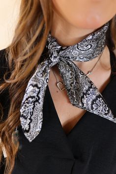 Our beautiful new line of wild rags are so fun and great for the upcoming seasons! Tie this in your hair, around your neck, or around your purse and you're set! This scarf is 100% silk. Size: Mini Wild rag measures 20 x 20 inches. SKU: #Mini Paisley-Black/Silver (1102-2009) Black Silk Scarf For Spring Gift, Wild Rag Ties, Bandana Print Silk Scarf As Gift, Silk Scarf With Bandana Print As Gift, Styling Wild Rags, Wild Rag Fashion, Womens Wild Rag Outfits, Black Bohemian Scarves With Bandana Print, Wild Rags