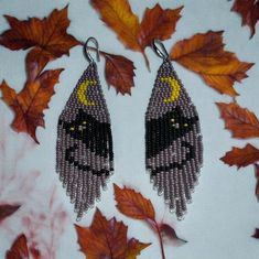 Introducing our exquisite Hand Beaded Purple Black Cat Earrings - a perfect blend of charm and elegance. Each earring features a meticulously crafted black cat, adorned with intricate purple beadwork that adds a touch of whimsy and sophistication. Made with high-quality materials, these earrings are lightweight and comfortable to wear, making them an ideal accessory for any cat lover or anyone looking to add a playful yet stylish touch to their outfit. Whether you're dressing up for a special oc Cat Geometric, Fall Moon, Black Cat Earrings, Cat Earrings, Earrings Black, Moon Earrings, Seed Bead Earrings, Geometric Earrings, Halloween Cat