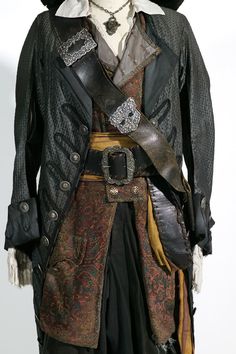 an old pirate costume is displayed on a mannequin's head and torso