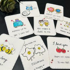 six embroidered coasters with words and pictures on them