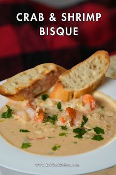 crab and shrimp bisque on a white plate with bread in the background text reads crab & shrimp bisque