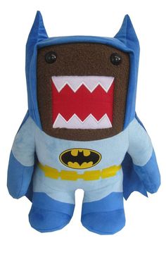 a stuffed toy with a batman costume on it's chest and mouth, is shown