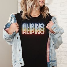 This retro Filipino neon shirt is a perfect gift for kuya, tatay and tito. [Philippines shirt, Filipino shirt, Filipina shirt, Manila, Cebu, Boracay, pinoy, pinay, Fil-Am shirt, Filipino American, Filipino Canadian] THE DESIGN IS PRINTED (NOT HEAT-PRESSED) on a high-quality and super soft Bella Canvas shirt. MATERIALS ------------------- * Solid colors: 100% ring-spun cotton * Heather Peach, Heather Dusty Blue, Heather Lilac, Heather Ice Blue: 99% ring-spun cotton, 1% polyester * Heather Forest, Heather Deep Teal, Dark Grey Heather, Heather Raspberry, Heather Orchid: 52% ring-spun cotton, 48% polyester SIZING ------------- Bella Canvas shirts are in unisex sizes closer to men's slim fit. Please refer to the sizing chart included in the pictures. Bella Canvas 3001 runs true to size. CUSTOME Filipino Shirt, Dog Obsessed, Retro Neon, I Hate People, Boracay, Champion Shirt, Georgia Bulldogs, Plain Tshirt, Cebu