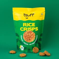 a bag of rice crispes sitting on top of a green surface