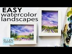 three watercolor landscapes are displayed on the wall