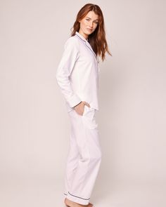 Classic white never goes out of style. Crisp, versatile, and always on-trend. This elegant white pajama set is accented with navy piping and finished with logo buttons. Premium 100% cotton twill makes this design crisp, comforting, and cozy. The moisture-wicking weave is yarn-dyed to help prevent fading. Cotton twill becomes more buttery with every wash. You will be tucked in luxury and off to dreamland. Bonne nuit. Classic White Cotton Sleepwear, Classic White Relaxed Fit Sleepwear, Classic Cotton Sleepwear For Pajama Party, Classic White Sleepwear For Pajama Party, Classic White Long Sleeve Sleepwear, White Pajama Set, White Cotton Pajamas, Cotton Pajama Set, White Pajamas