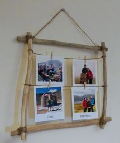 a wooden frame with pictures hanging on it