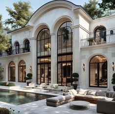 an artist's rendering of a luxurious mansion with pool and outdoor seating area in the foreground