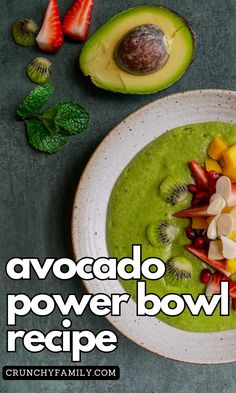 avocado power bowl recipe on a plate with sliced strawberries and kiwi