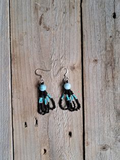 Blue/Purple Opalescent Beaded Feathers - My Community Made Turquoise Earrings With Black Round Beads, Turquoise Beaded Earrings With Black Beads As Gift, Turquoise Hand-strung Earrings For Gift, Blue Hand-strung Round Beads Earrings, Let Go Of Things, My Community, Shades Of Turquoise, Stay True, Glass Seed Beads