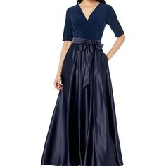 Nwt Alex Evenings Surplice Neckline Ballgown With Full Satin Skirt & Jersey Bodice This Timeless Ballgown Features A Full Satin Skirt With Matching Belt, Paired With A Comfortable Jersey Bodice For A Look Of Unmatched Comfort And Glamour. Elbow-Length Sleeves Provide The Perfect Coverage. You're Going To Love How You Feel In This Beautiful Gown. Navy/Dark Blue Size 6 Style 81351533 Msrp $199 Short/Elbow Length Sleeves V Neck Pleated Wrap Style Top Self Tie Belt Matte Top And Shiny Back Back Zipp Alex Evenings, Surplice Neckline, Satin Skirt, Elbow Length Sleeve, Beautiful Gowns, Full Skirt, Tie Belt, Wrap Style, Ball Gowns