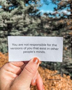 someone is holding up a card that says you are not responsible for the versions of you that exist in other people's minds