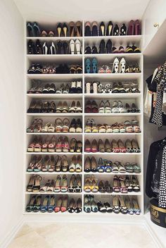 a closet filled with lots of different types of shoes