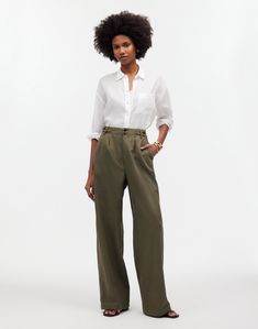 Made of a drapey TENCEL™ lyocell and linen blend, these wide-leg pants have sailor-inspired button tabs at the waist.Full-length inseam that hits right above the ground when worn with heels.12 3/4' rise, 23' leg opening, 30' inseam. Petite inseam: 27 1/2'; tall inseam: 33'.48% TENCEL™ lyocell/33% cotton/19% linen.Do Well: TENCEL™ lyocell fibers are derived from sustainable wood sources in a closed-loop process; for each piece made at the Fair Trade Certified™ factory, we Khaki Trousers, Street Style Winter, Straight Leg Trousers, Knit Midi Dress, Wide Leg Trousers, Straight Leg Pants, World Of Fashion, Fashion Online Shop, Wide Leg Pants