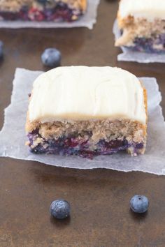 blueberry breakfast cake with white frosting on top