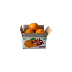 a box filled with oranges sitting on top of a table