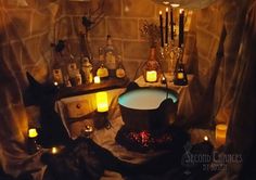 a room with candles and bottles in it