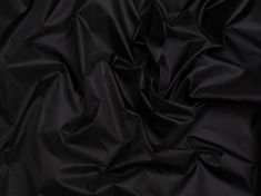 the black fabric is very soft and shiny