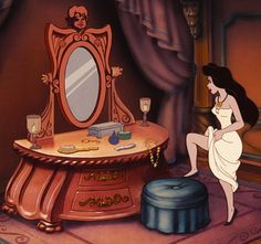 an animated image of a woman sitting in front of a vanity with a mirror on it